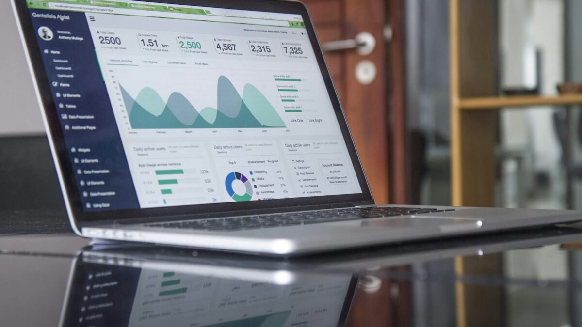 MVP Analytics - Laptop displaying analytics dashboard with graphs and charts, highlighting data analysis for business.